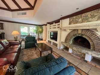 Covered patio with archways, terracotta tiles, garden mountain view in Panamonte Estates Boquete
