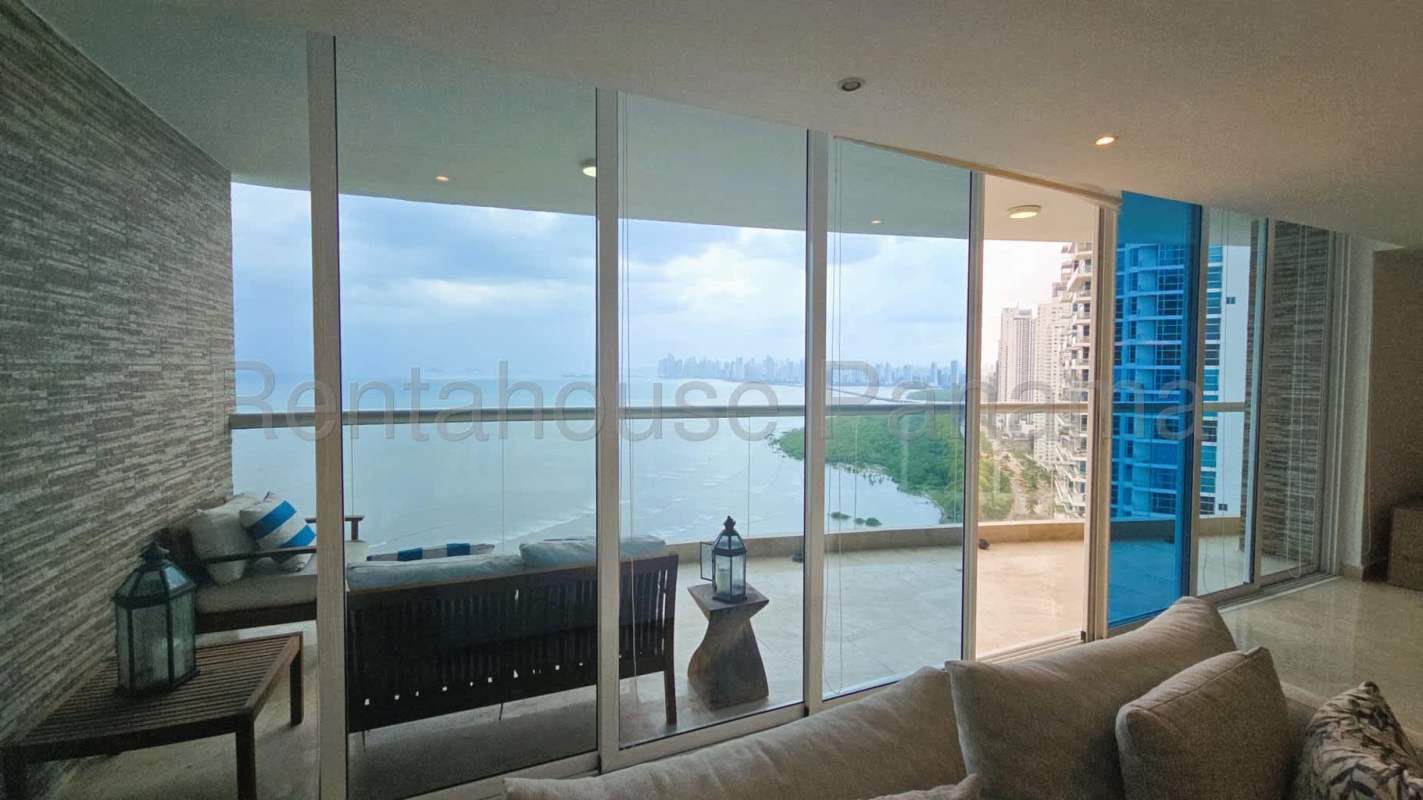 Elegant living room with marble floor, panoramic balcony ocean view in PH Lumiere Costa del Este Panama City