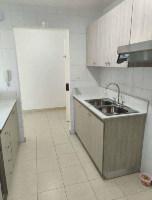 Modern bathroom with shower enclosure pedestal sink mirror in PH Majestic Garden Panama City