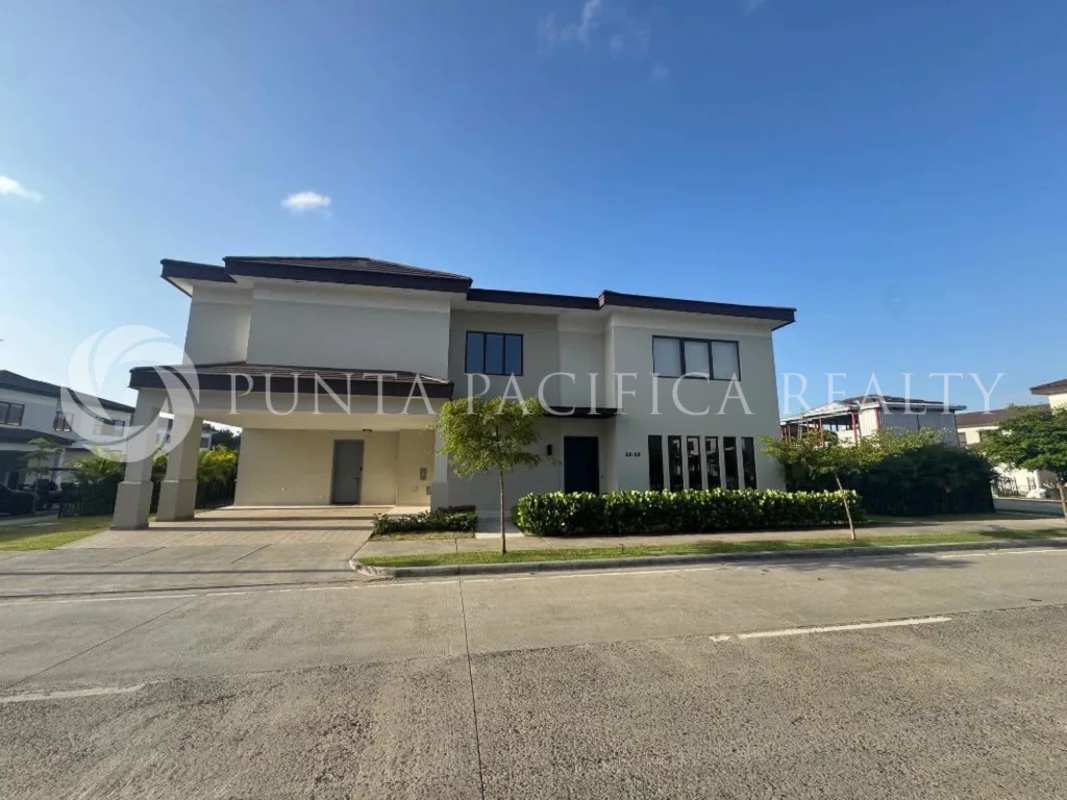 Exterior of modern two-level luxury house with carport and gardens The Woods Santa Maria