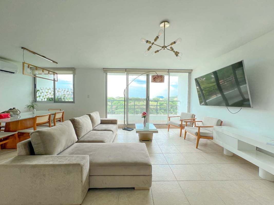 Bright bedroom with AC, window view furnished apartment Clayton Park Panama