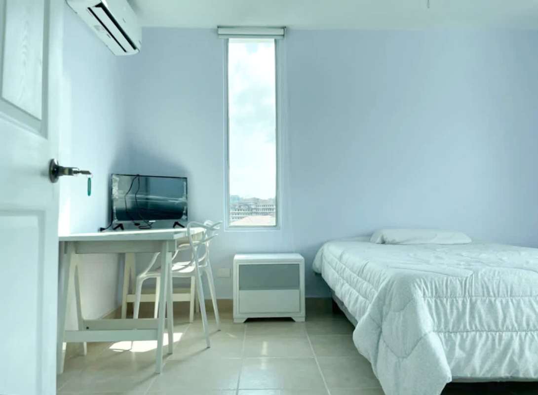 Furnished master bedroom with AC, closet in Clayton rental apartment Panama