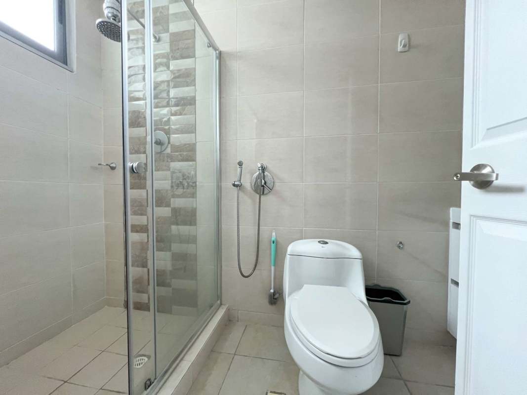 Contemporary bathroom with glass enclosed shower tiles Panama apartment rental