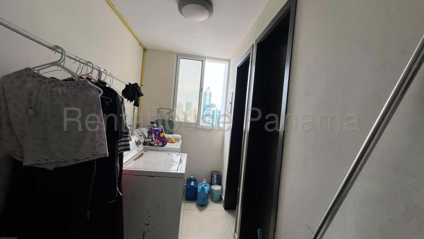 Laundry room in PH Metropolitan Park apartment with washer space and window, Obarrio Panama City Panama