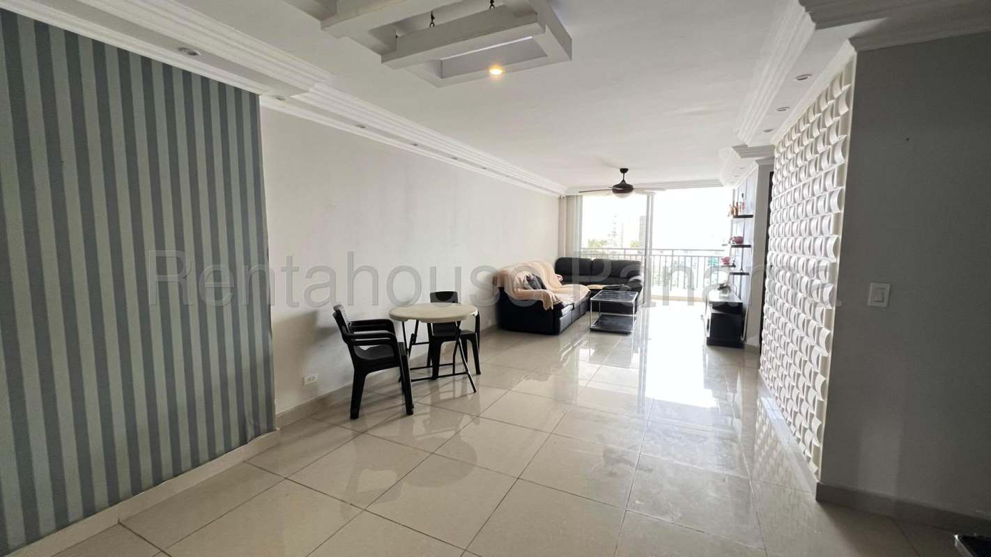 Covered rooftop swimming pool with dining area and city skyline at PH Metropolitan Park Obarrio Panama