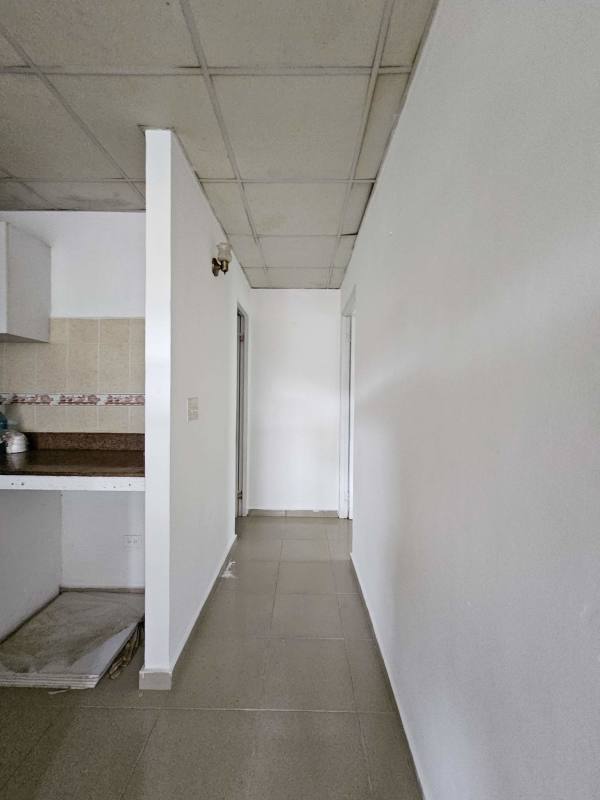 Empty bedroom white walls tiled floor closet space Praderas de San Lorenzo Panama