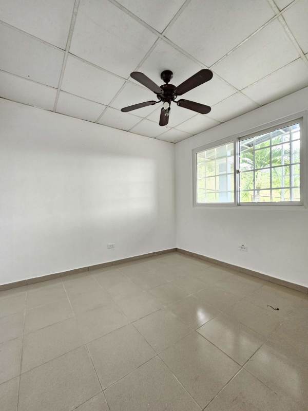 Bedroom with large window ceiling fan drop ceiling Praderas de San Lorenzo Panama