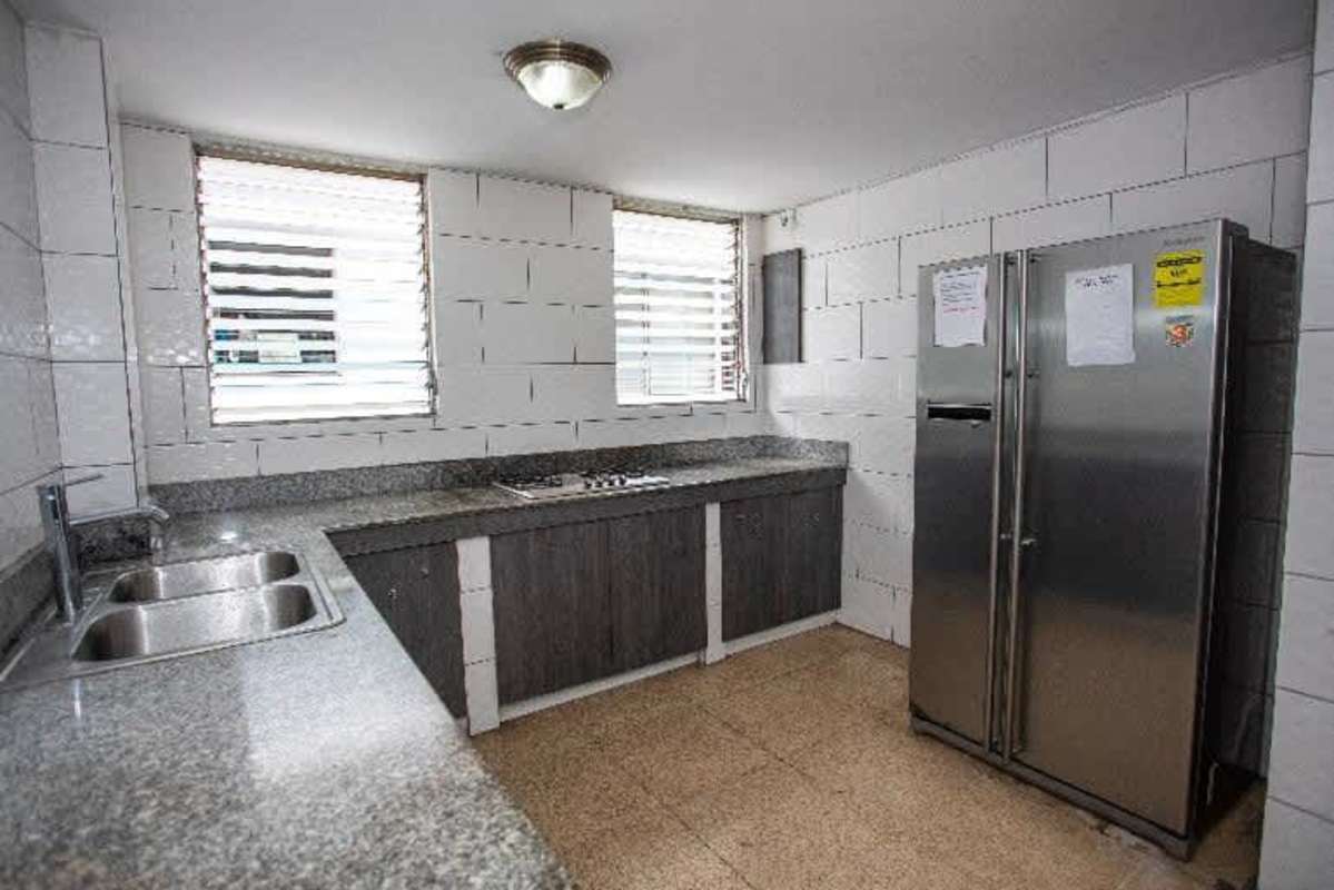 Laundry facilities with washers dryers bright and clean in PH Bogotá investment building El Cangrejo Panama