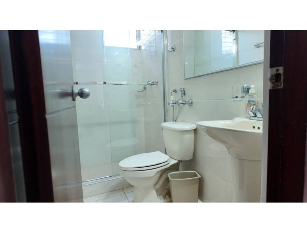 Bathroom with glass-enclosed shower, granite countertop at PH McGregor Heights Panama