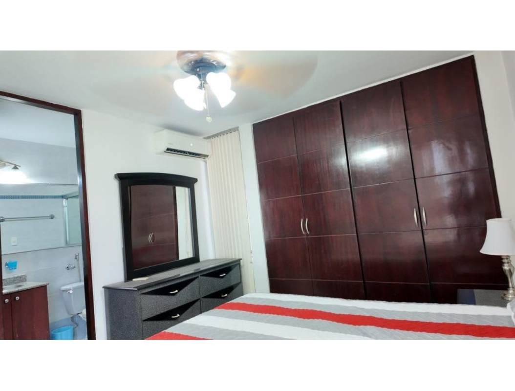 Bedroom with AC, blinds, and dark wardrobe at PH McGregor Heights Ancón Panama