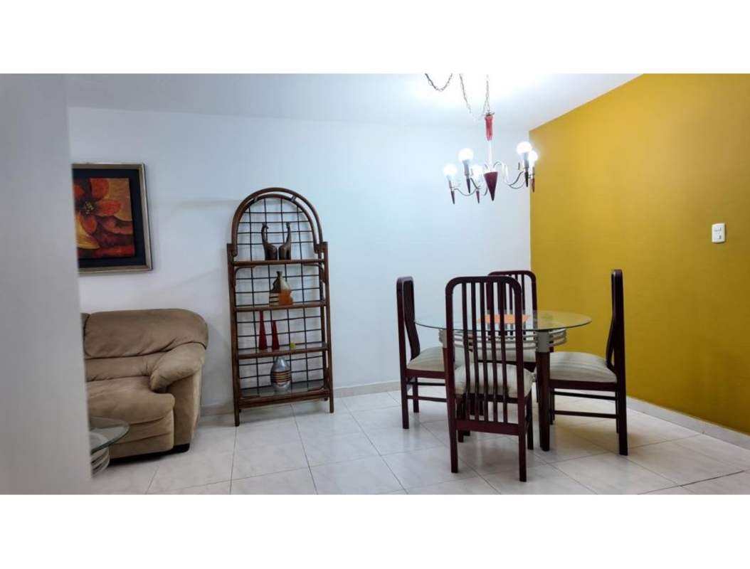 Contemporary dining with glass table, open living space PH McGregor Heights Panama