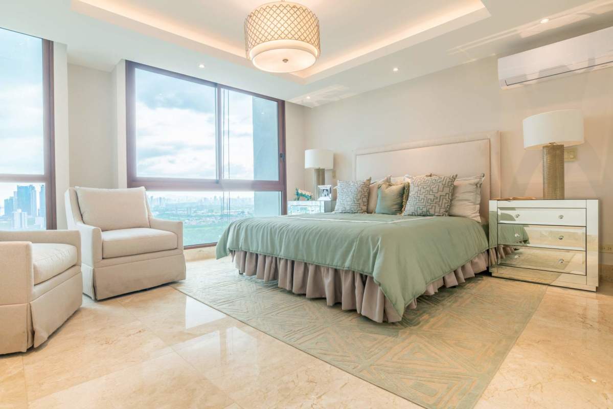 Contemporary bedroom with floor-to-ceiling windows and ocean views Santa Maria Panama