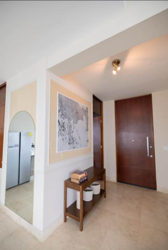 Open modern kitchen with appliances granite counters in Punta Pacifica PH Oceanaire