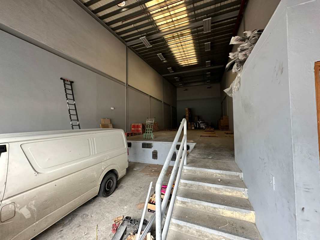 Warehouse interior van ramp high roof loading Don Bosco business area Panama