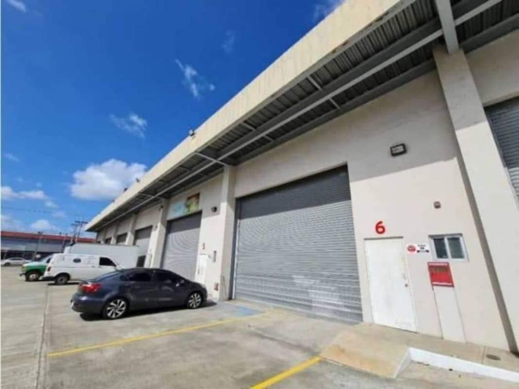 Spacious warehouse interior high ceiling industrial lighting truck access Don Bosco Panama