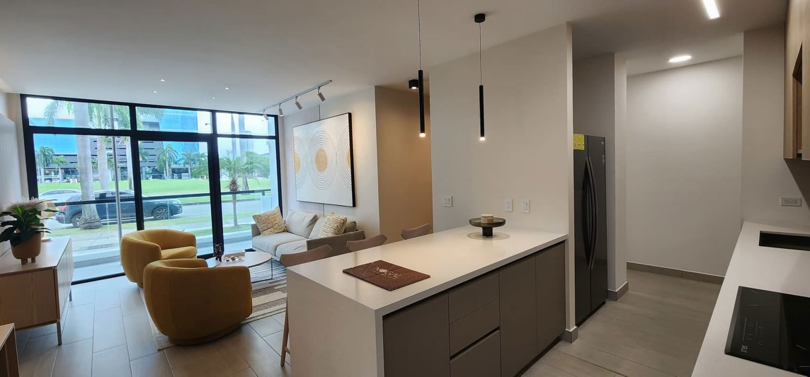 Open-concept living room with full height windows and modern finishes PH Costa View Tower Costa del Este Panama