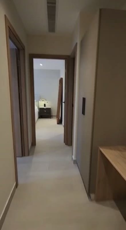 Bathroom with walk-in shower glass enclosure and floating vanity in PH Costa View Tower Panama City