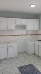 Empty living room with tiled floor large windows and entry door David Chiriquí Panama