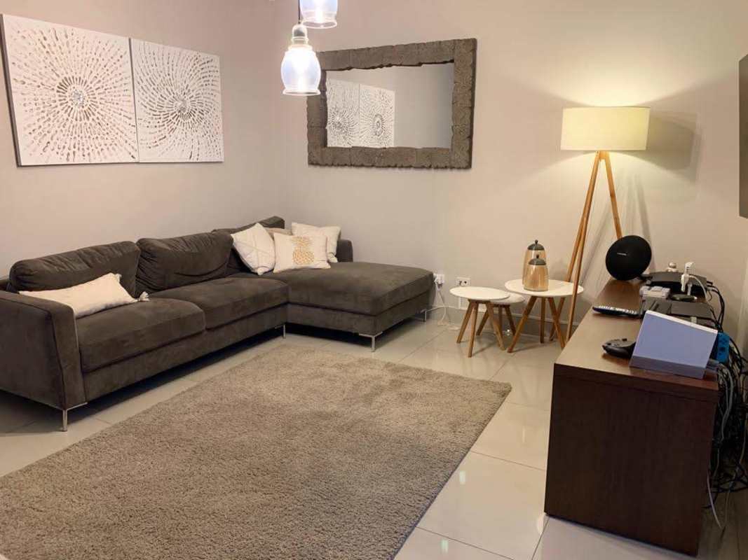 Open concept modern kitchen with granite countertops and appliances at PH Latitude Costa del Este