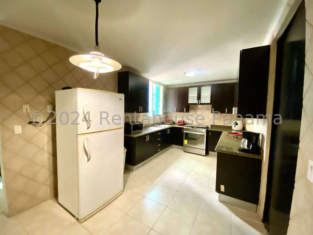 Bedroom with built-in closet and en-suite bathroom ocean city views PH Pacific Star Panama