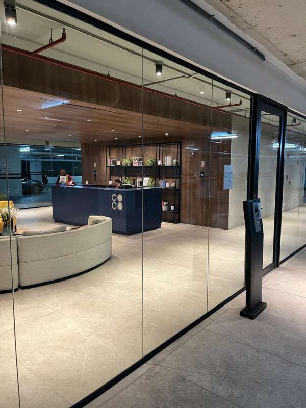 Spacious bathroom with glass enclosed shower and modern vanity PH Coco del Mar Panama City