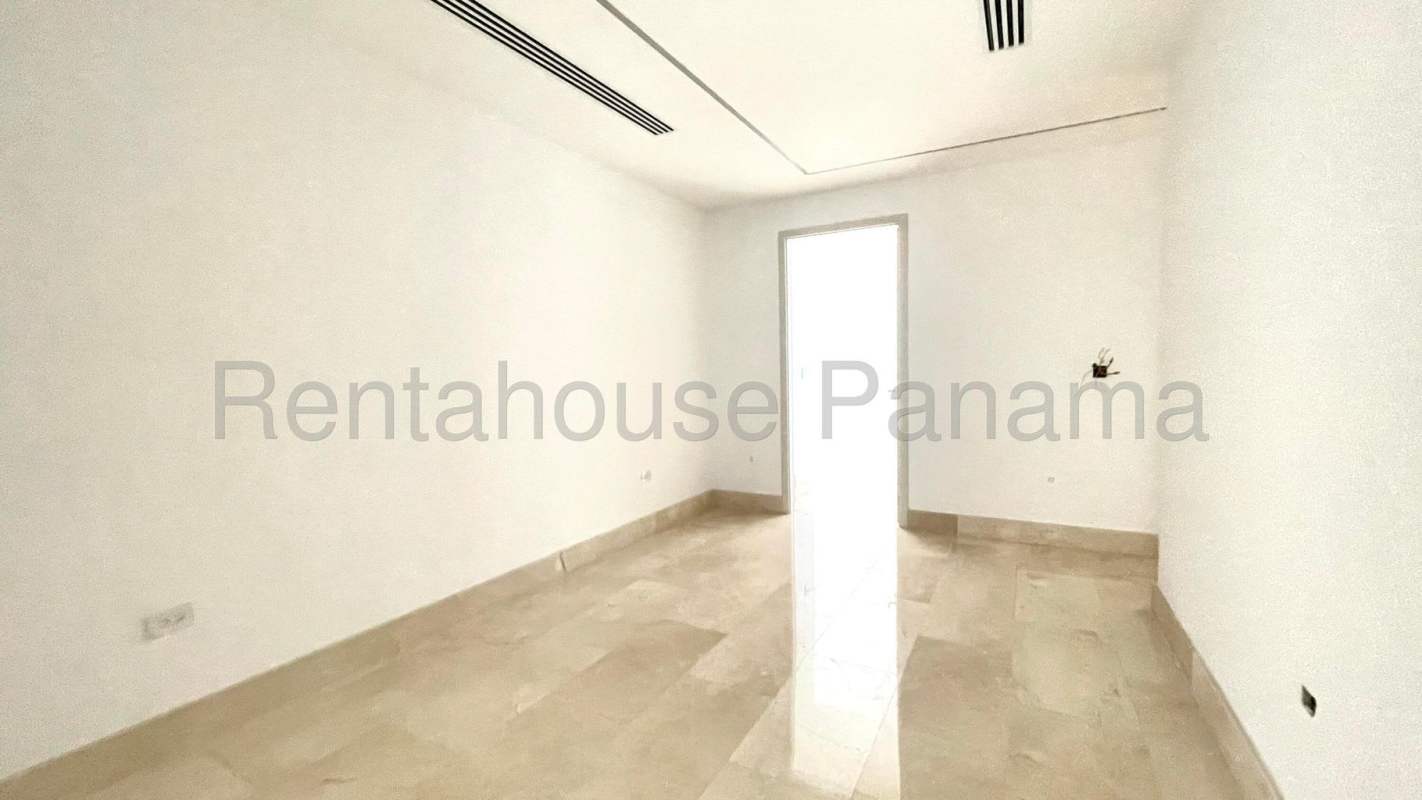 Wide balcony terrace with glass railing offering spectacular ocean views Coco del Mar Panama