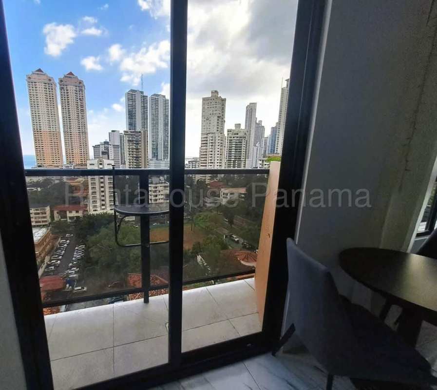 Fully equipped gym with large windows and skyline view PH The Gray Calle 50 Panama