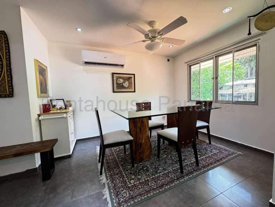 Modern bathroom with glass-enclosed shower in Reserve at Clayton apartment Panama