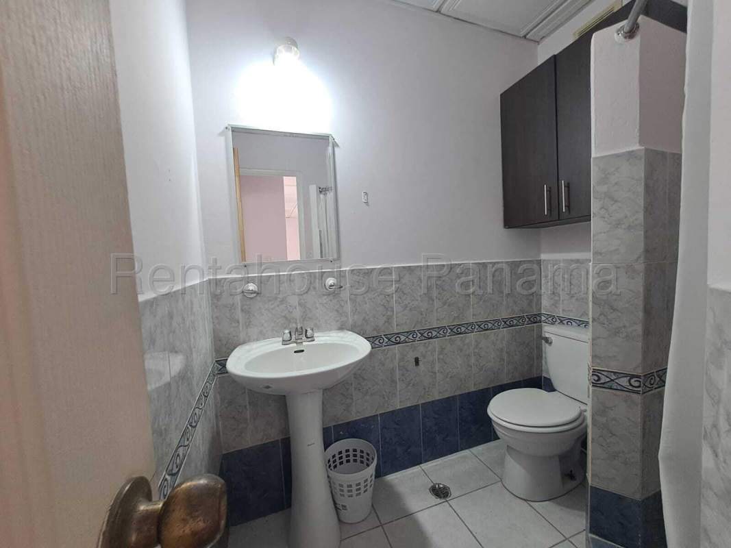 Bathroom with walk-in shower tile walls PH Condado Gardens Panama