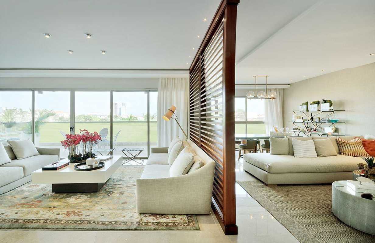 Elegant bathroom with double sink vanity and marble tiles at GreenGarden Santa Maria