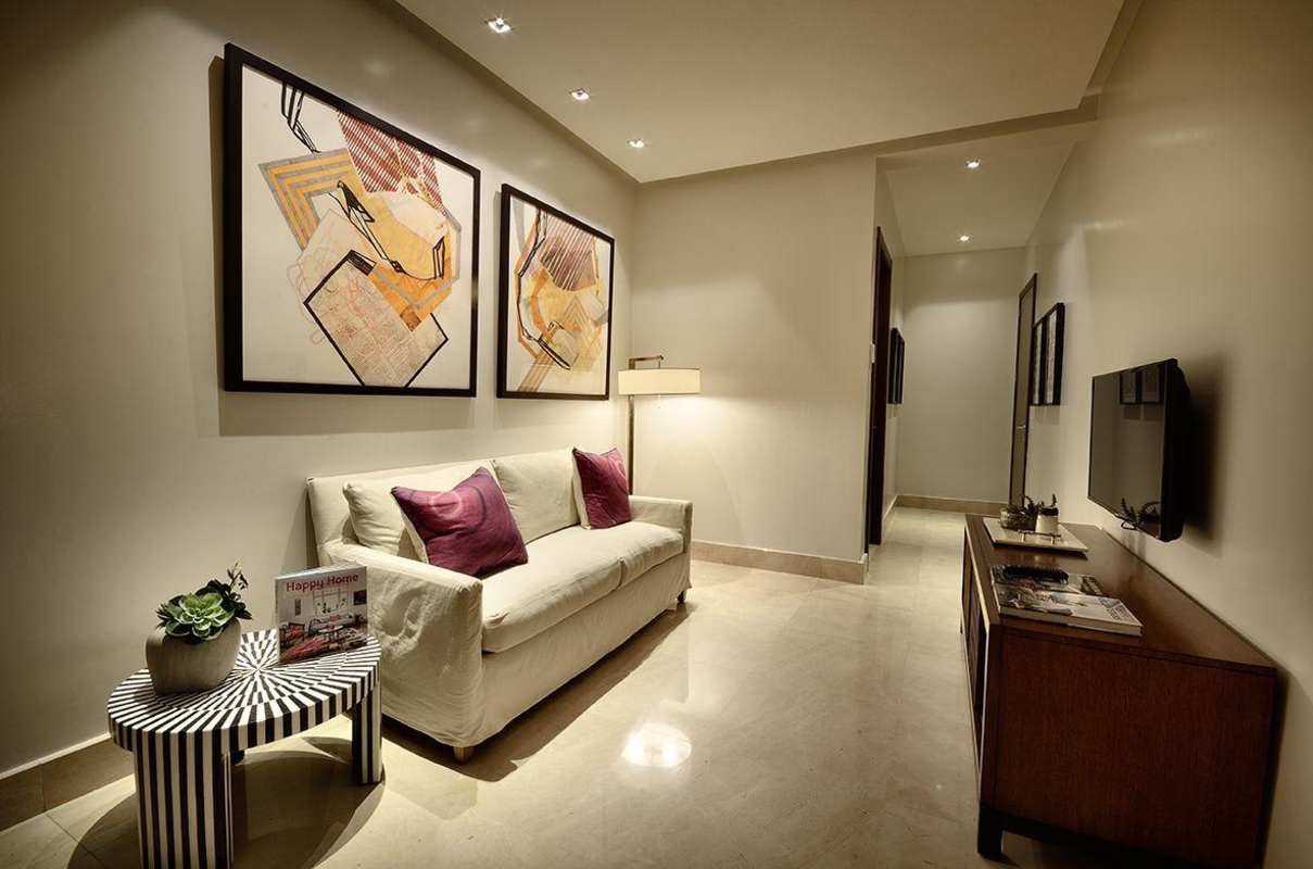 Spacious terrace with outdoor dining overlooking golf course in GreenGarden Santa Maria