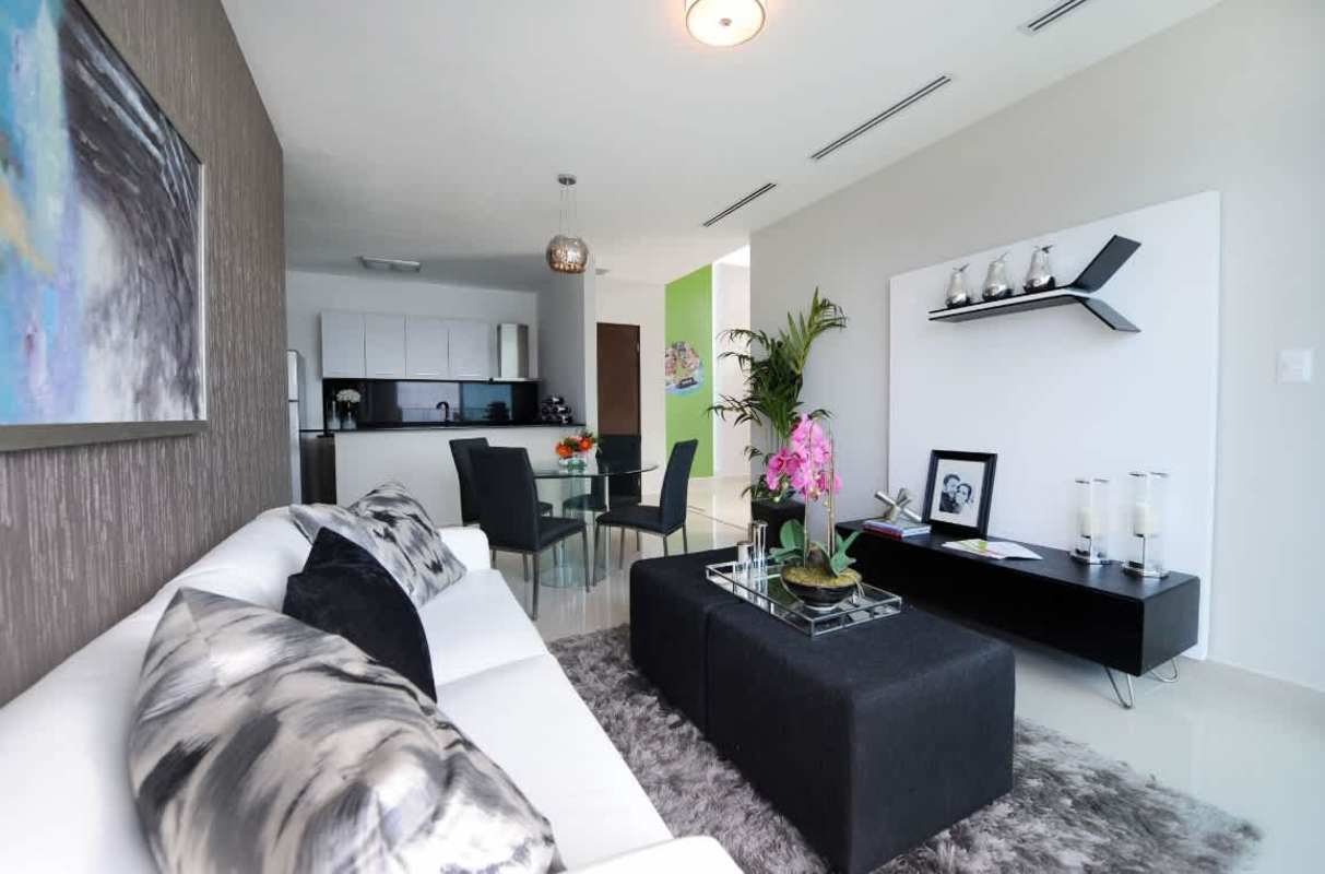 Open floor plan living and dining area with modern décor at Condado Towers in Condado del Rey Panama