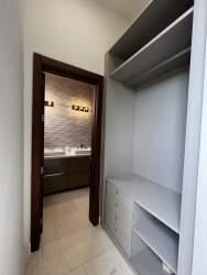 Bright family lounge with panoramic windows in Coronado penthouse condo