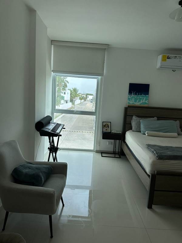 Interior staircase with ceramic tile and metal railing in Costa Esmeralda house Panama City
