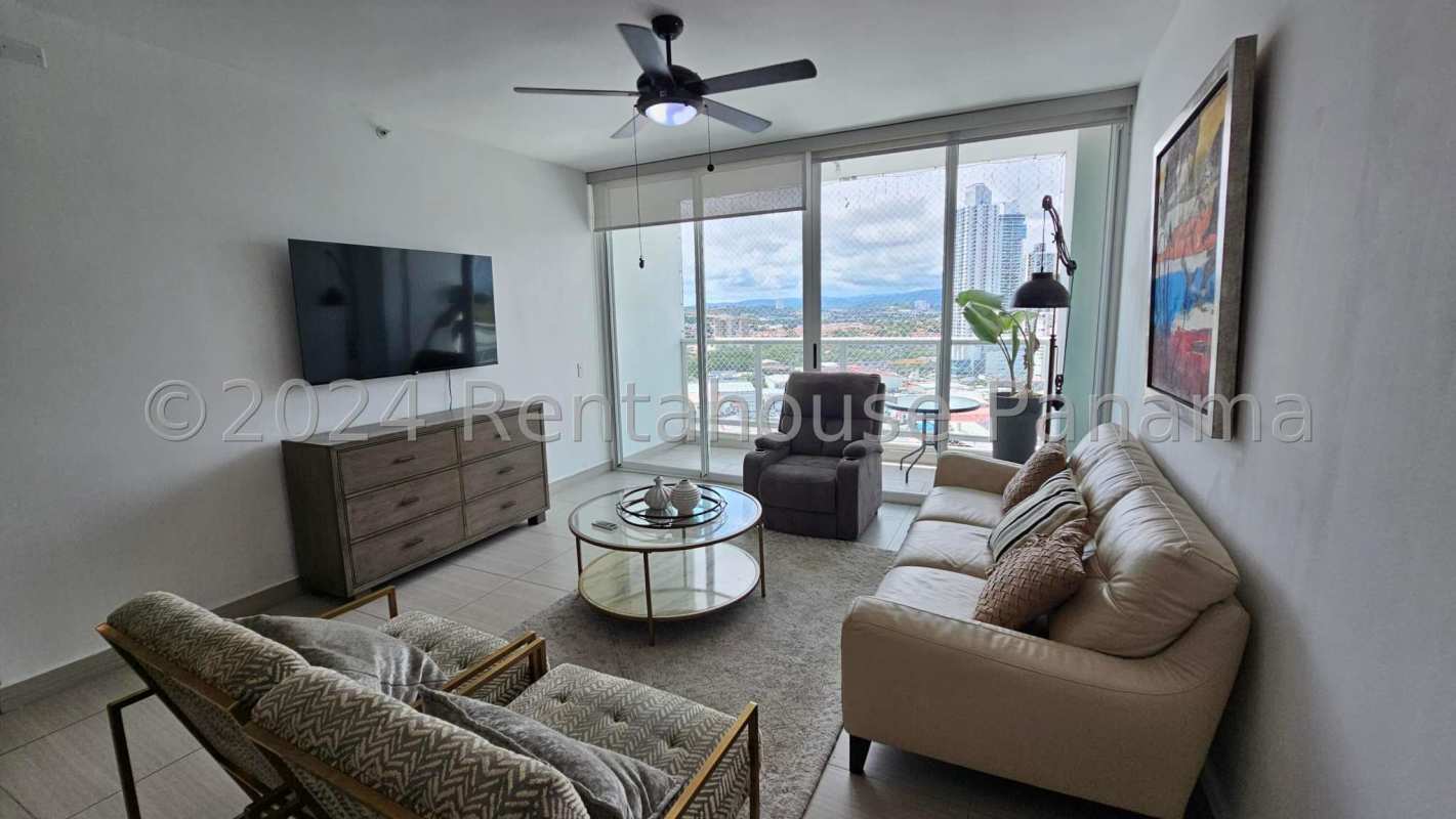 Bright living and dining room with balcony and panoramic city views in PH Asia Costa del Este Panama City