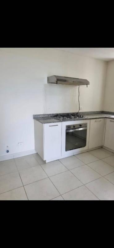 Efficient kitchen with granite top, stove, oven in Las Acacias Panama