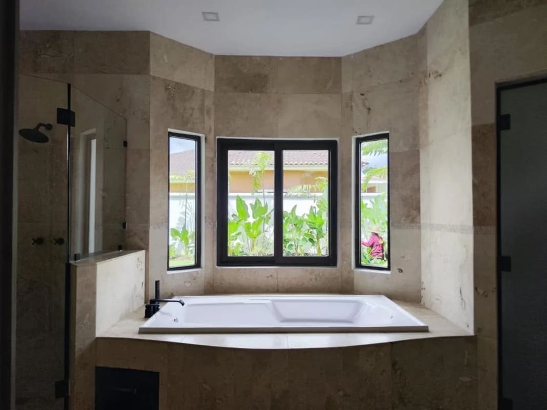 Private backyard swimming pool with garden landscaping Costa Sur luxury house for rent Panama