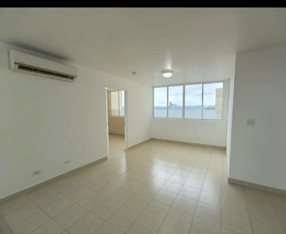 Minimalist living room with large windows, sea view, tiled flooring PH Edison Park Panama
