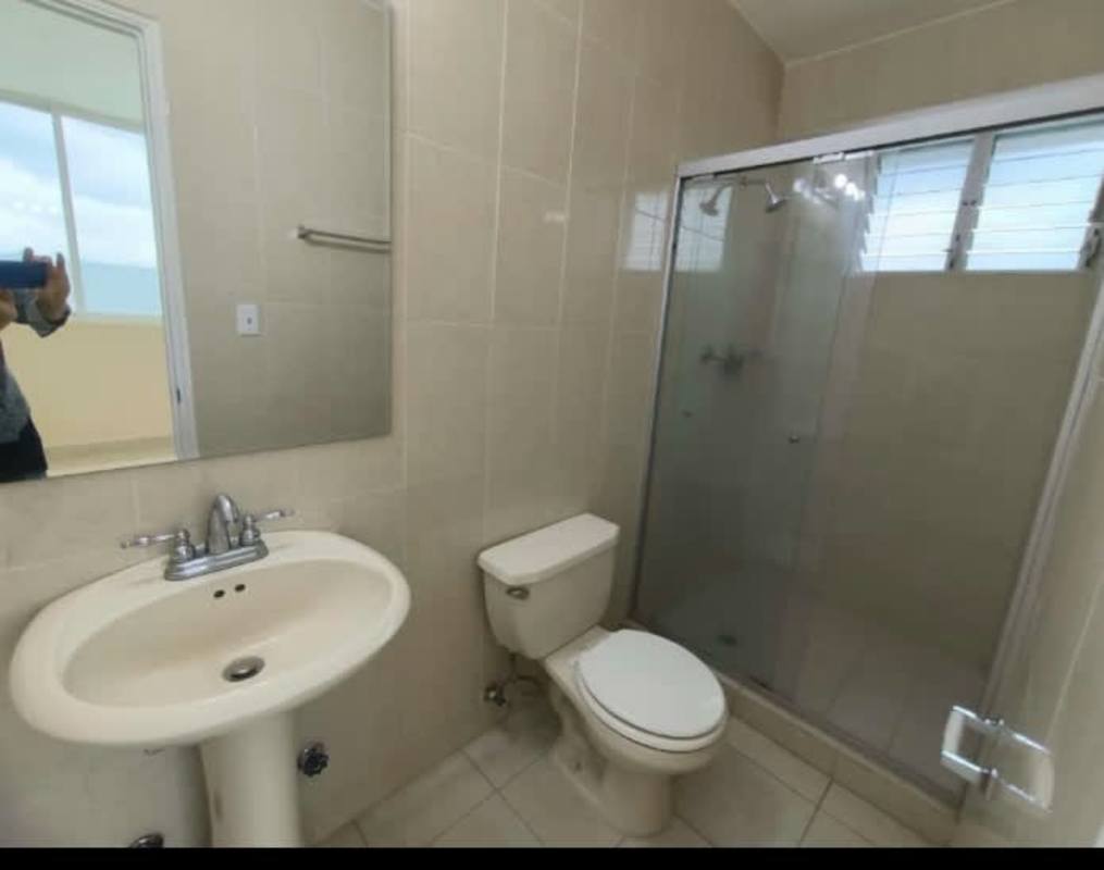 Contemporary bathroom tiled walls, pedestal sink, glass shower, PH Edison Park