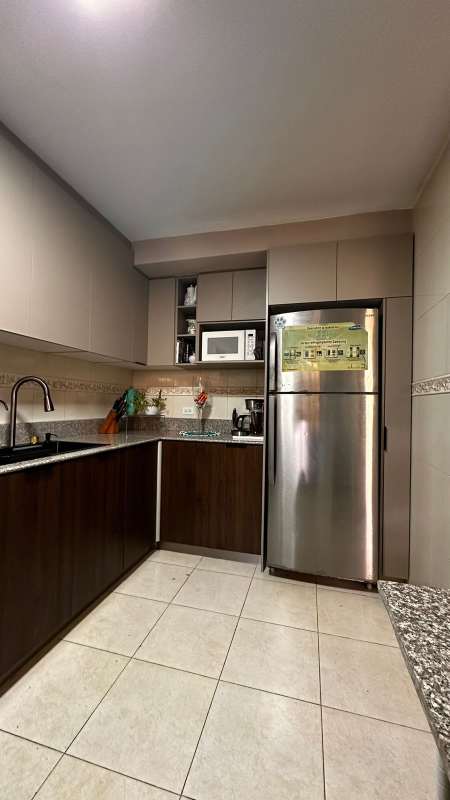 Modern equipped kitchen granite countertops stainless appliances Condado del Rey Panama