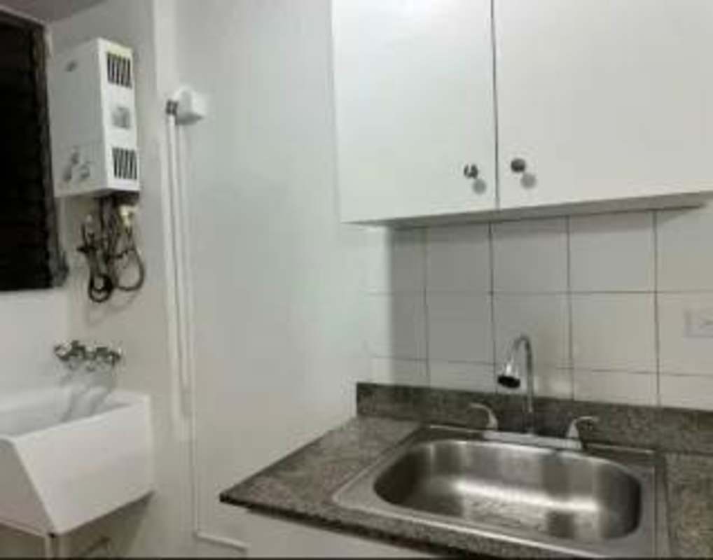 Rooftop pool with city skyline at Bella Vista Residences condo project