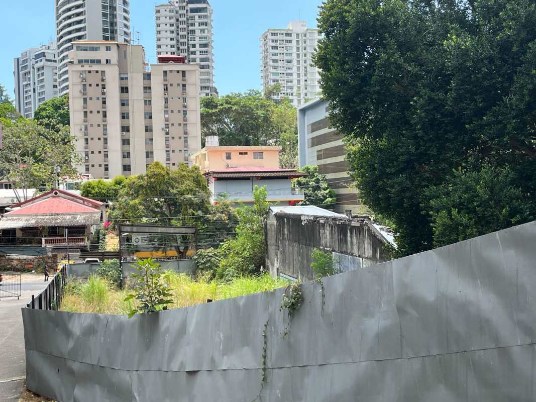Vacant land surrounded by residential and commercial buildings with tall apartment views Panama City