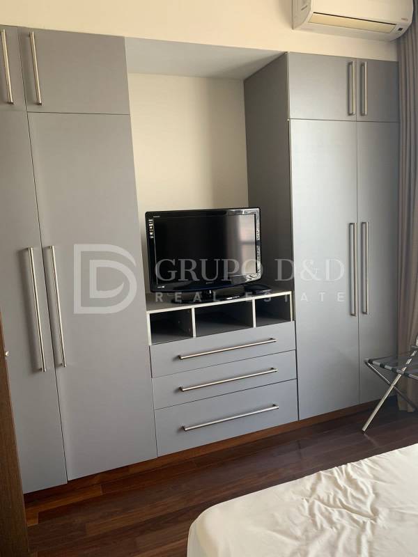 Second bedroom with built-in wardrobe and split AC, modern design at PH Denovo Obarrio Panama