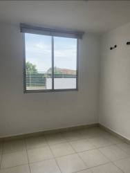 Gated entrance with security and building of Terrazas del Oeste Costa Verde