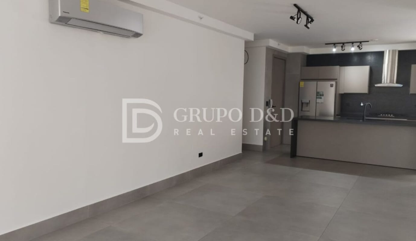 Modern open living area and kitchen with stainless appliances PH Victory Wellness Panama City