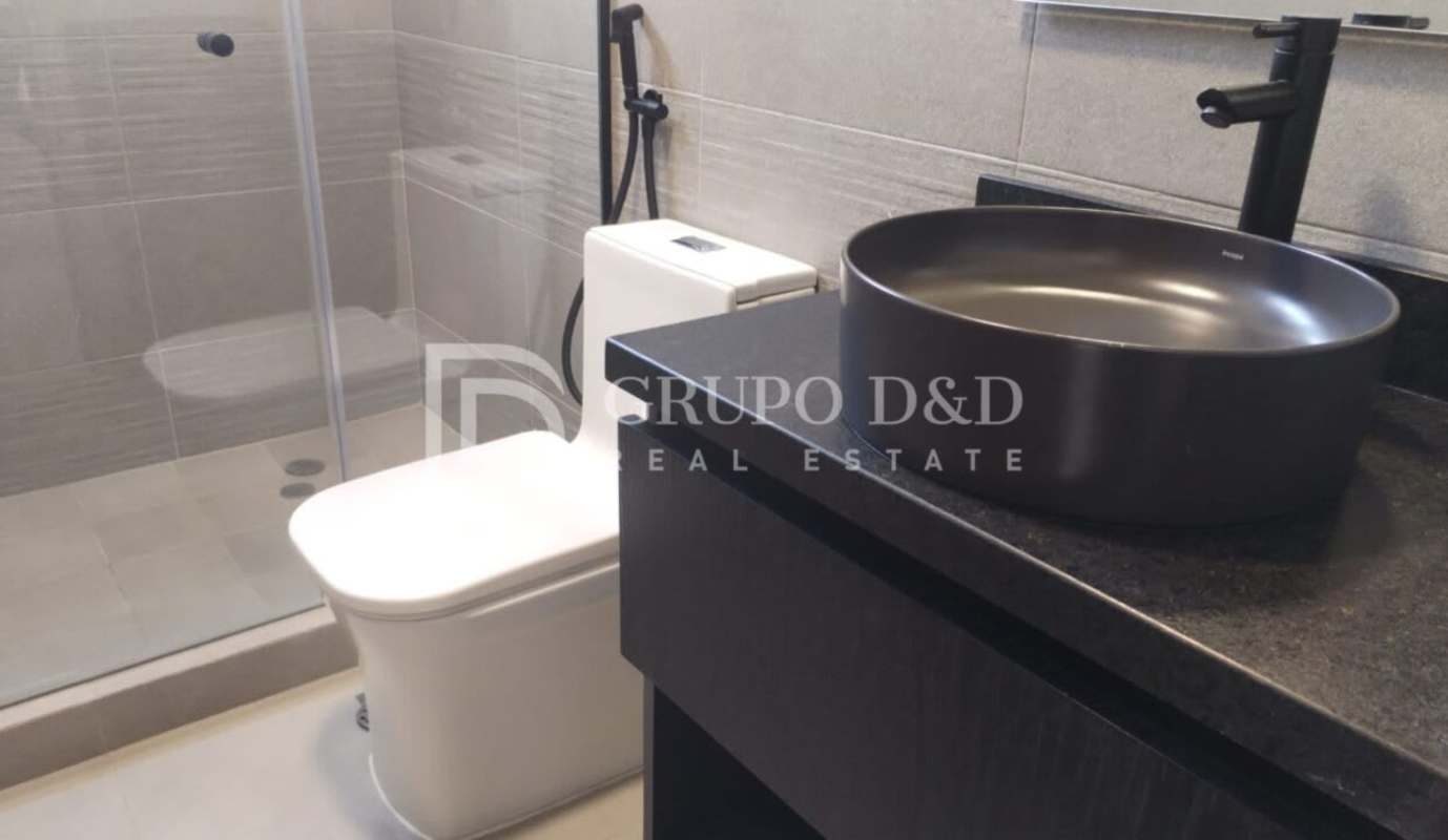 Bathroom with vessel sink, walk-in shower, gray tile in PH Victory Wellness Coco del Mar Panama City