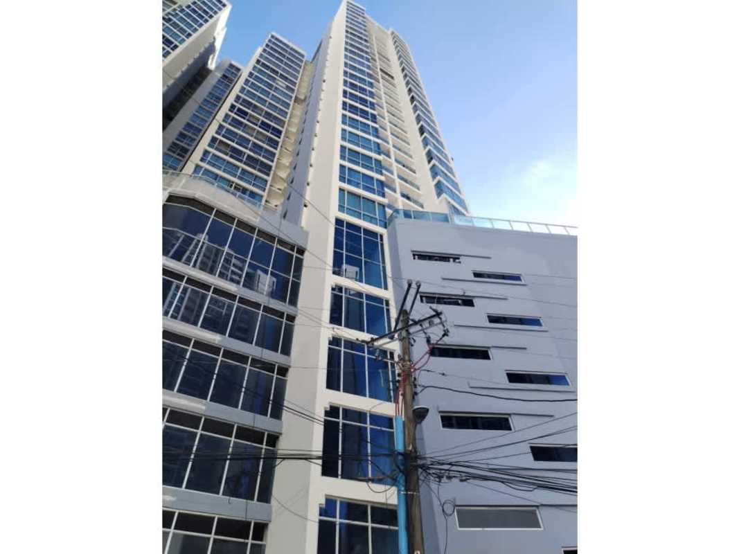 Contemporary bathroom with tiled walk-in shower and vanity sink at PH Coral Tower Panama City