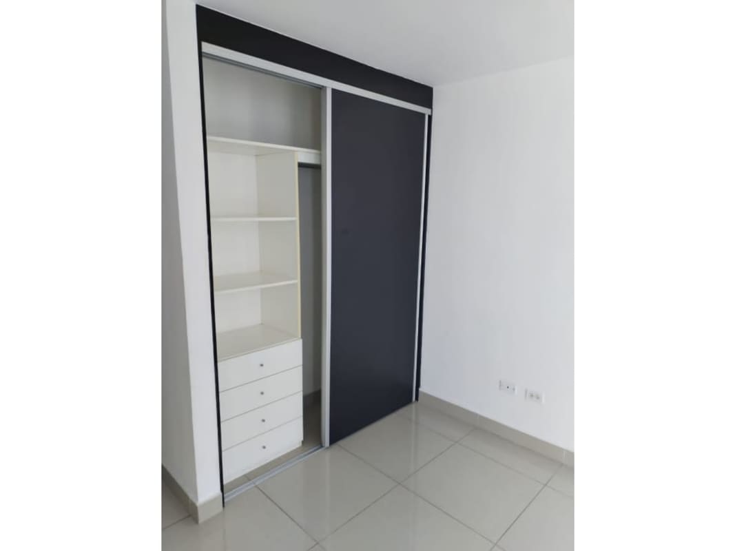 Open kitchen with granite countertops and stainless sink at PH Coral Tower Panama City