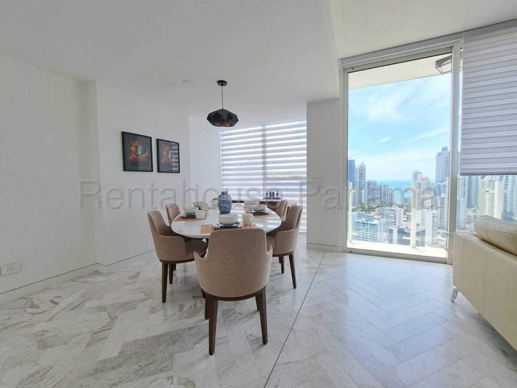 Modern open living room with panoramic ocean views at PH Quartz Tower San Francisco Panama