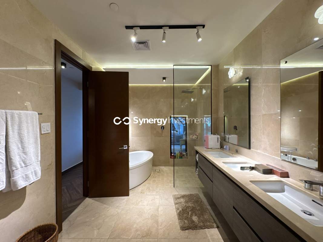 Master bedroom in garden apartment with terrace access at The Reserve Santa Maria Panama